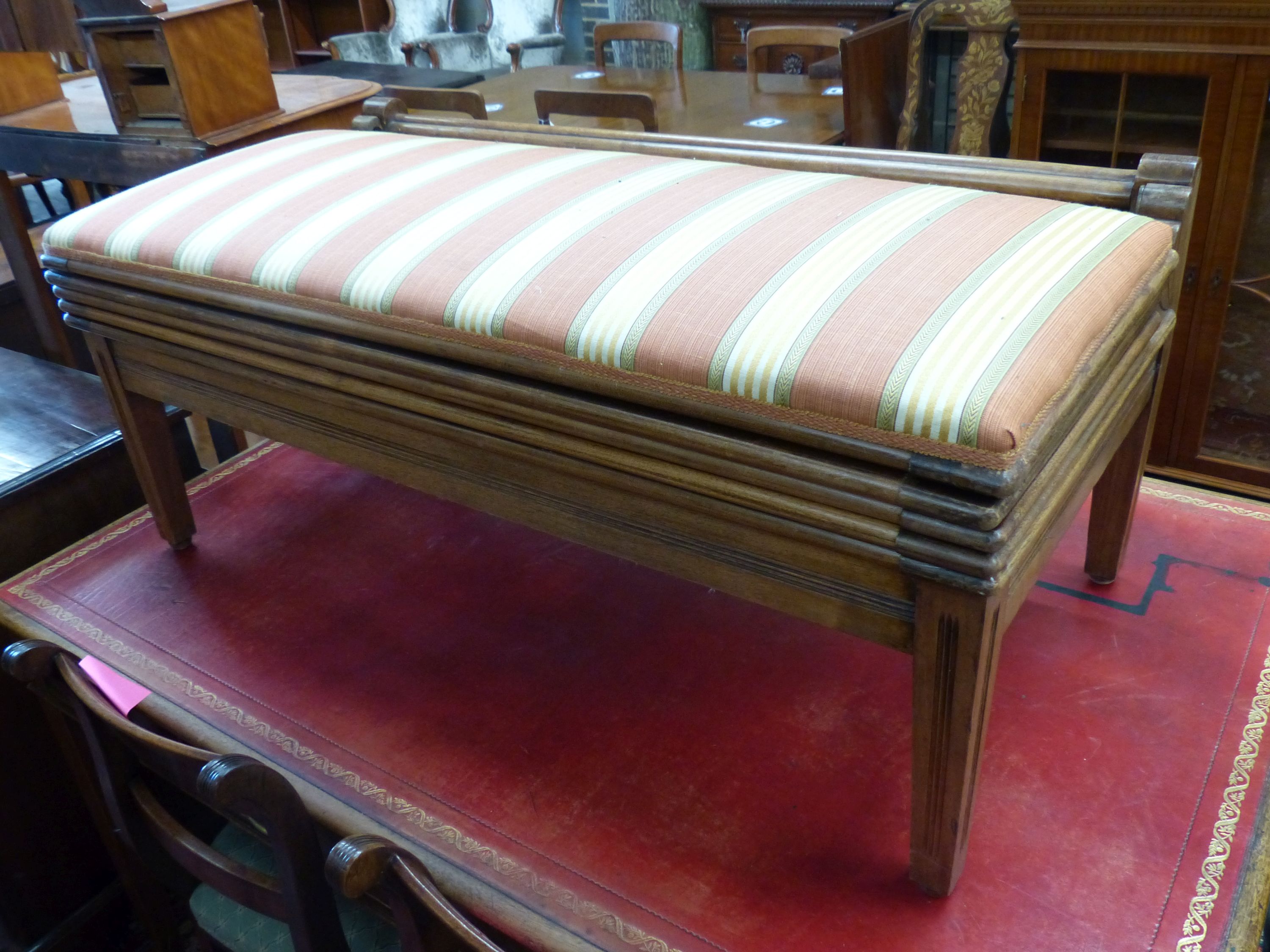 A mahogany trouser press-cum-bench seat, circa 1900, height 45cm, width 106cm, depth 54cm